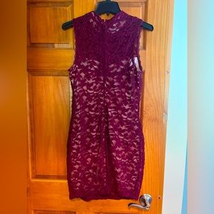 Beautiful lace form fitting dress. Worn once to Christmas party